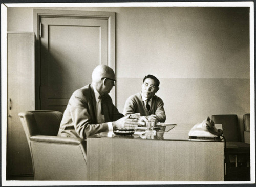 Charles Protzman sitting at a desk