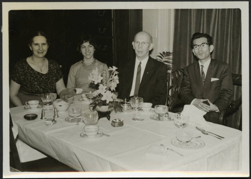 Mr. and Mrs. Polkinghorn with two individuals at a table