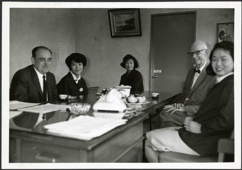 Charles Protzman sitting at a table