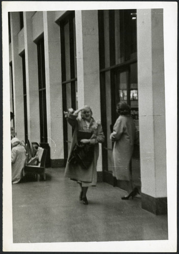 Mrs. Protzman stands near a woman