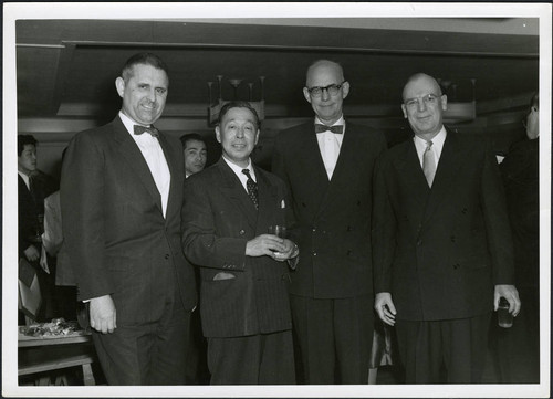 Charles Protzman with three men