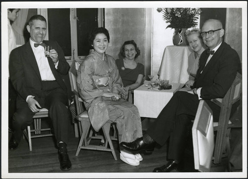 Charles Protzman and his wife socializing