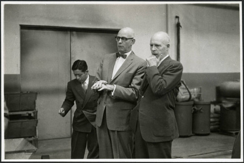 Charles Protzman with two men