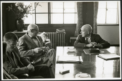 Charles Protzman sitting at a table