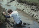 Student in mud