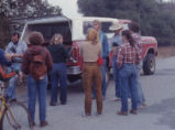 Students standing by truck