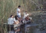 Students collecting data on a boat