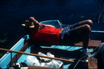 Man resting on a boat