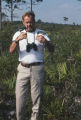 Glen Wolfinder and two Florida scrub jays