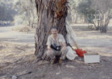 Larry Oglesby teaching under a tree