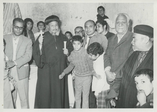 Coptic Bishop, Munīr al-Qamṣ Basīlīyūs 'Abd al-Masīḥ, and English teacher with others