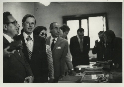 Henry Kissinger with scholars and texts at the Coptic Museum