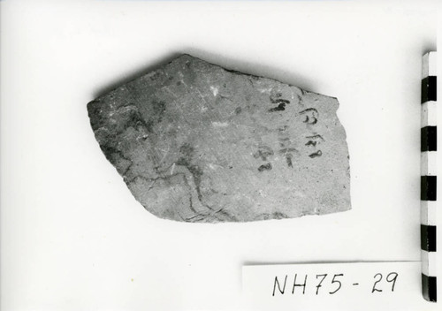 Stone with writing