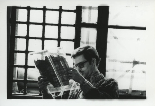 James Brashler examining Nag Hammadi codices