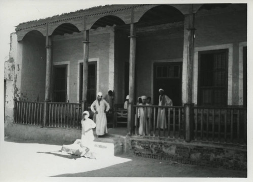 Egyptians on porch