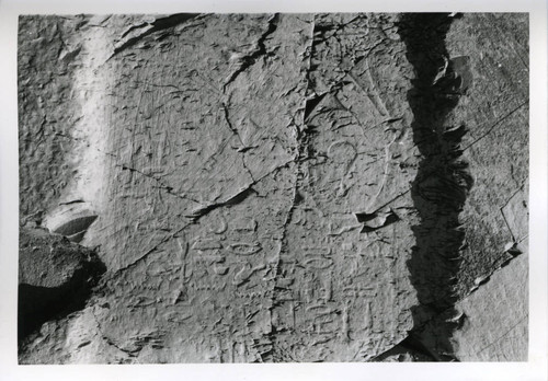 Close-up of hieroglyphs on cracked surface