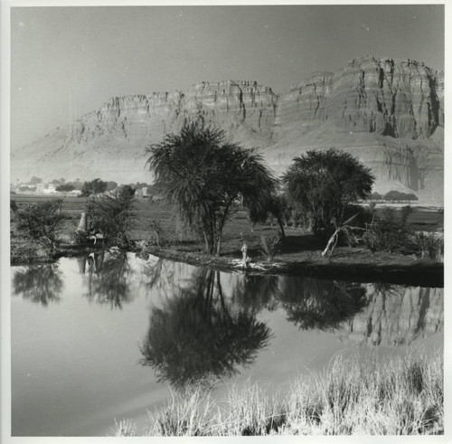 View of Jabal al-Ṭārif cliff from local lake
