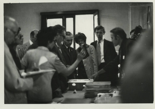 Henry Kissinger views codices at the Coptic Museum