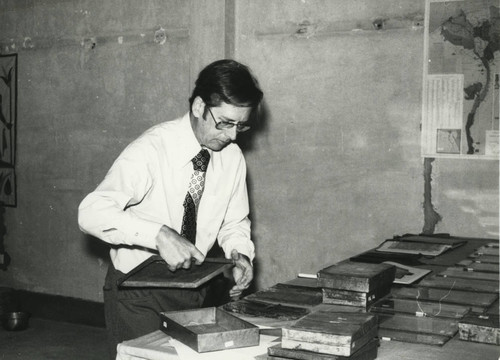 Robinson with metal boxes