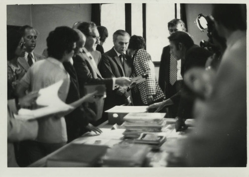 Henry Kissinger discusses texts with Charles Hedrick at the Coptic Museum