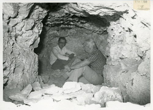 James Robinson and Torgny Säve-Söderbergh in cave at Jabal al-Ṭārif cliff