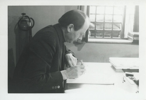 Hans-Martin Shenke reading manuscript