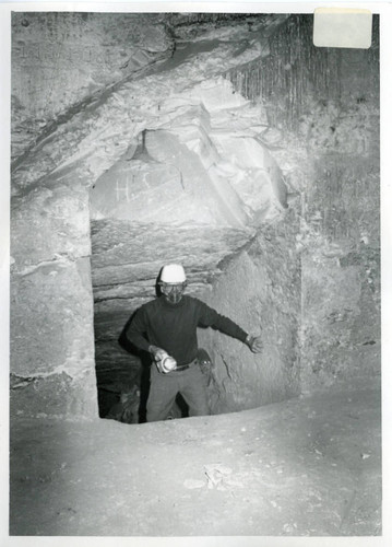 James Robinson in shaft of cave T 73