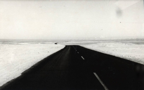 Postcard of a desert highway, Egypt