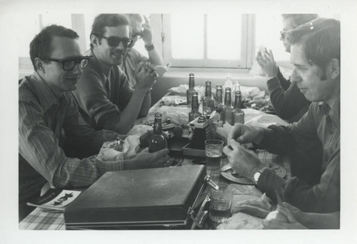 Brashler, Robinson, Sieber and others having a drink