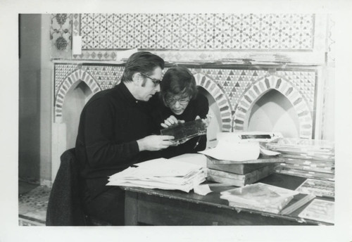 James Robinson and Bentley Layton examining codices