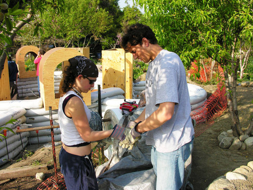 Students handling barbed wire