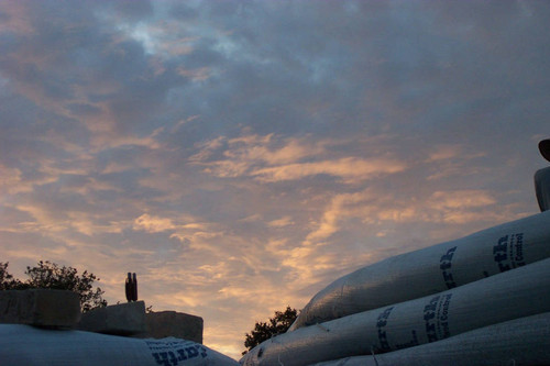 Clouds looming over earthbags