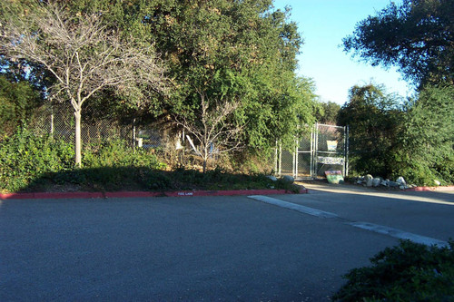 Welcome sign on fence