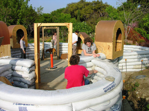 Students and dog at dome construction