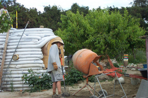 Student looks at cement mixer