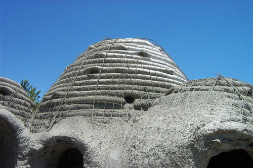 Earth Dome construction with concrete layer