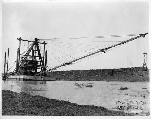 Clamshell Dredge Neptune Number 2 on the Sacramento River