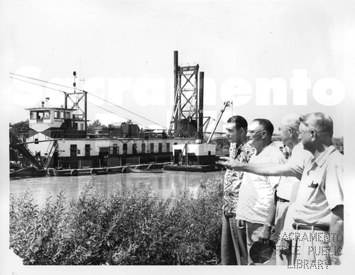 Spectators and the Suction Dredger "Papoose"