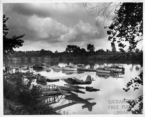 A seaplane moored on the river