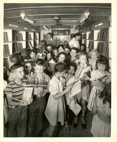 Children inside Sacramento City Library Traveling Branch