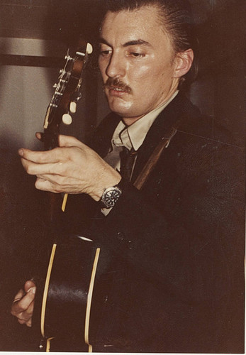 Close up Little Charlie with guitar