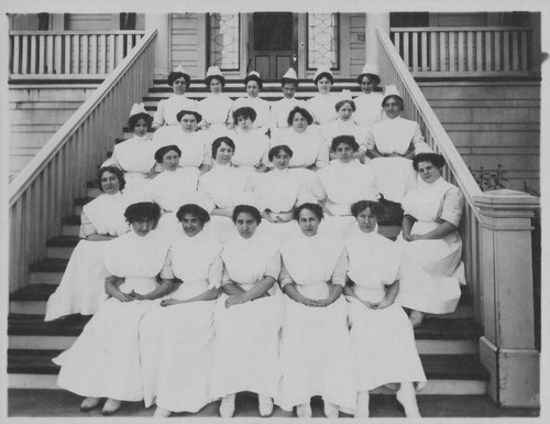 Nurses Sitting on the Front Steps of the White Hospital