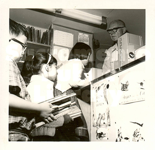 Sacramento City Library bookmobile charge desk