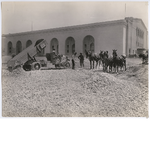 Workers laying rock for roadway in front of Oakland Municipal Auditorium, circa 1914