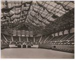 Oakland Municipal Auditorium Arena decorated with bunting and flags, circa 1914