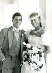 Mr. and Mrs. Alan J. Peril weeding photograph — Calisphere