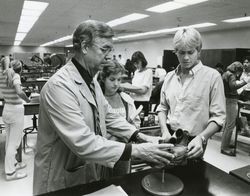 Doug Dean instructing students in biology class, circa 1984 — Calisphere