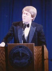 Michael Adams speaking at Associates' Dinner, 1983 — Calisphere