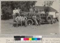 The Winters fire truck built by O. Hirst, Placerville, and Sacramento, and delivered May 1931. Mr. Hirst, builder, and some of the Winters Rural Fire Department the day the new truck was delivered. W. Metcalf. May 1931
