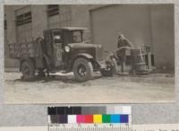 Checking the volume of water thrown by nozzles of different size at pressures of 50, 100 and 150 lbs., from the truck pumper. Metcalf. 1928